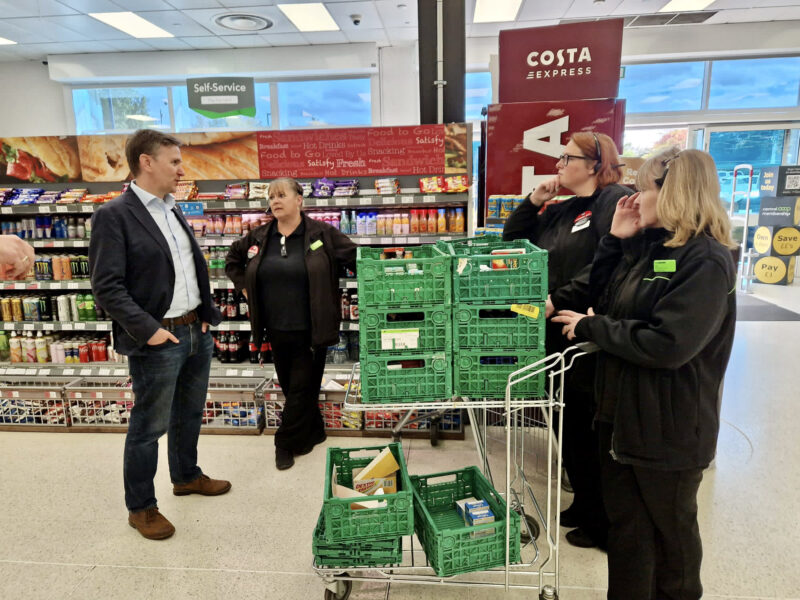 Andrew meeting with staff at the Co-op